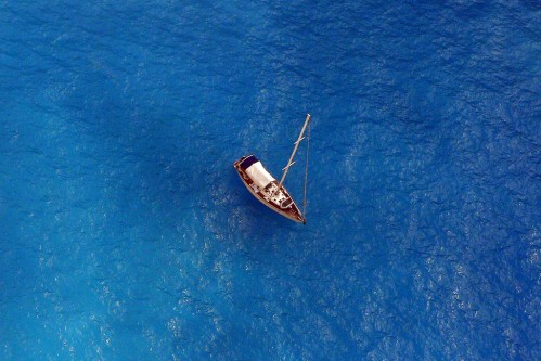 boat in blue sea By annie-a flickr user